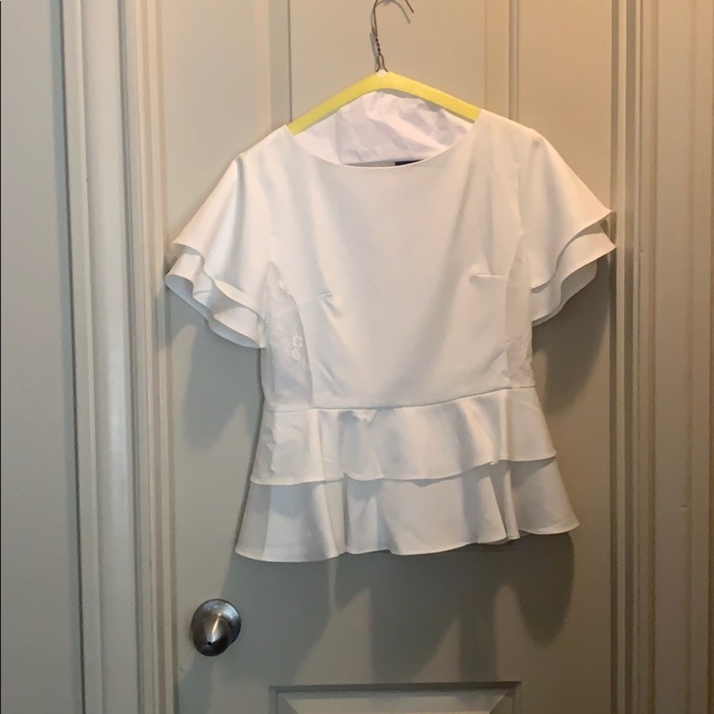 Peplum top with bell sleeve